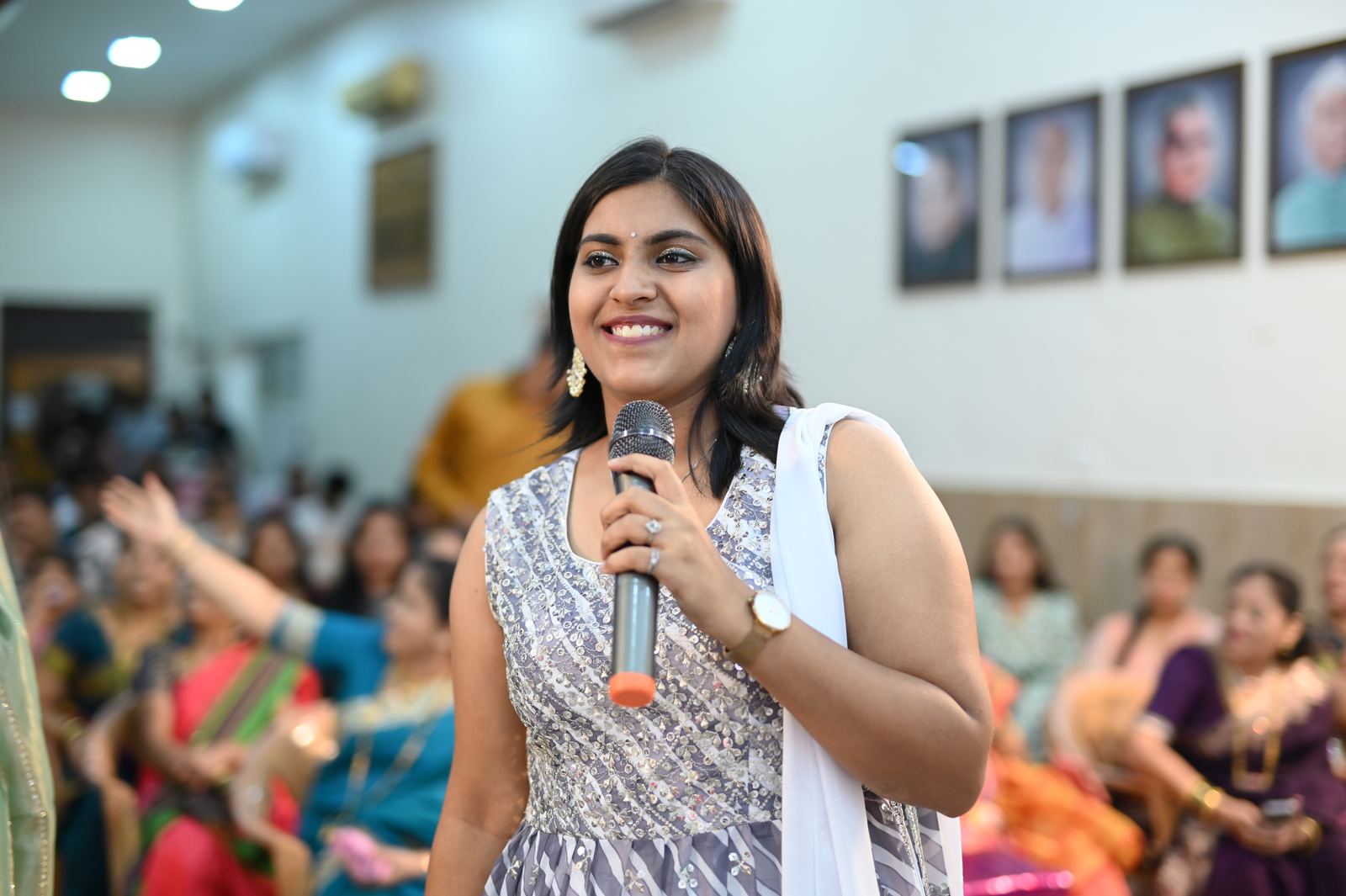 Anchor Ananya Kundu engaging a lively audience