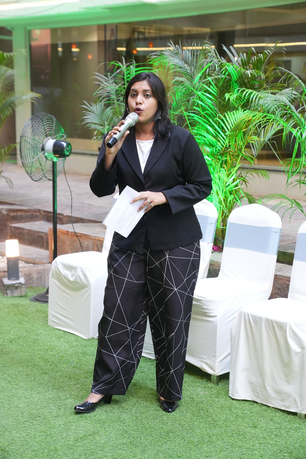 Anchor Ananya Kundu hosting corporate galas