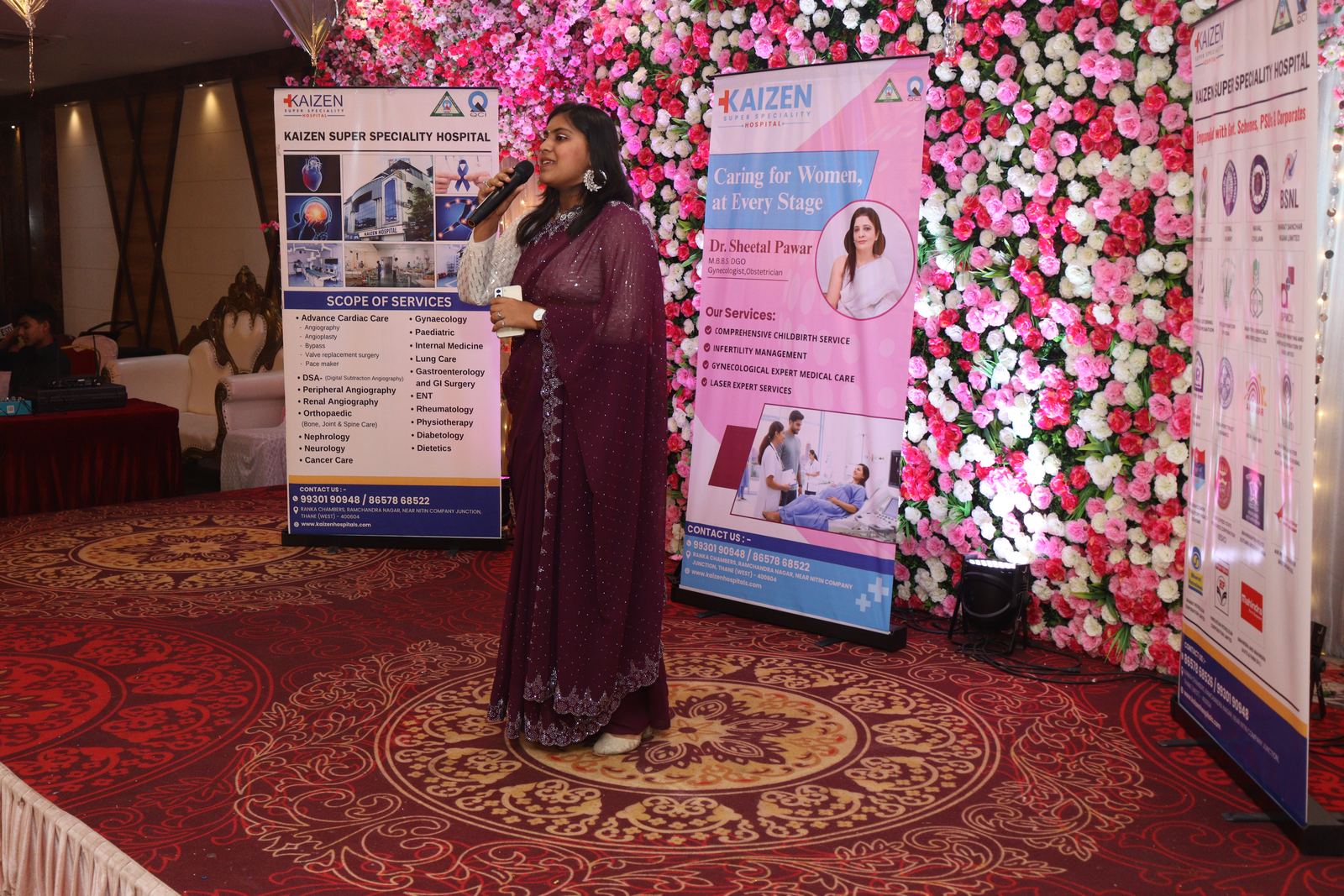 Anchor Ananya Kundu speaking at a corporate event