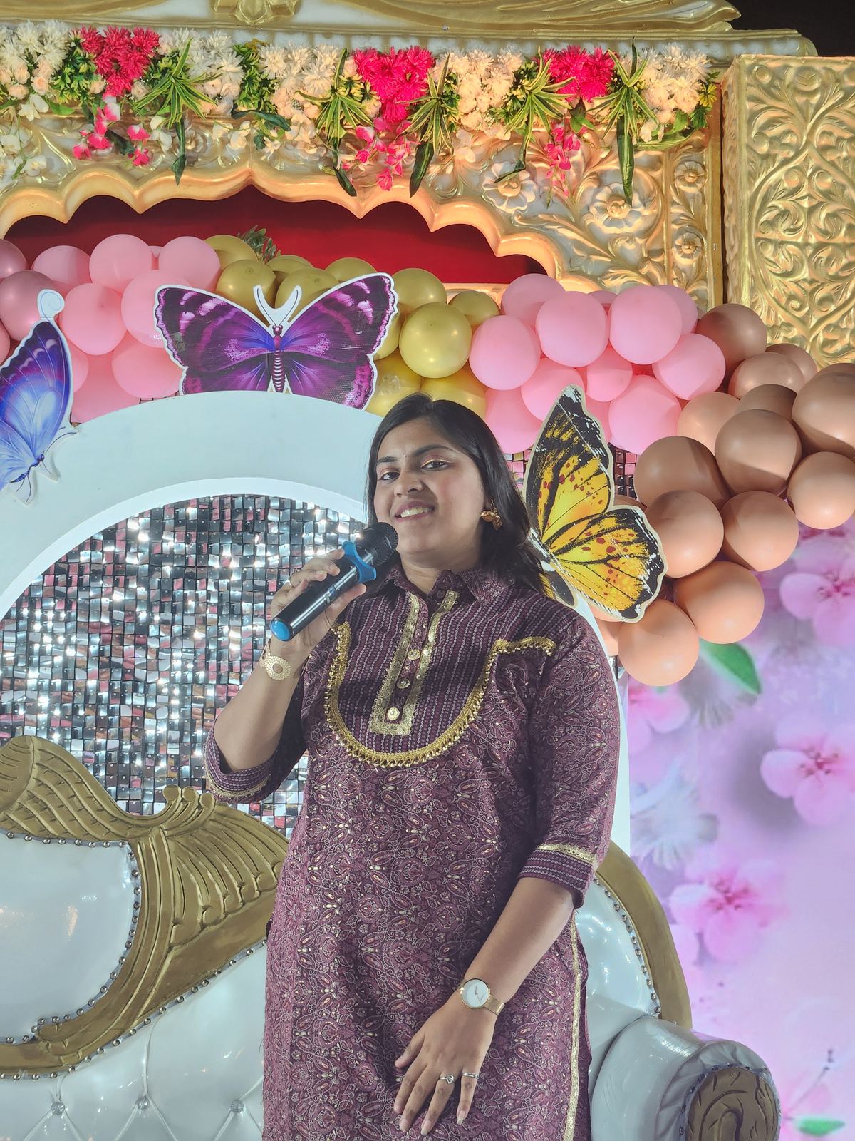 Anchor Ananya Kundu hosting a naming ceremony