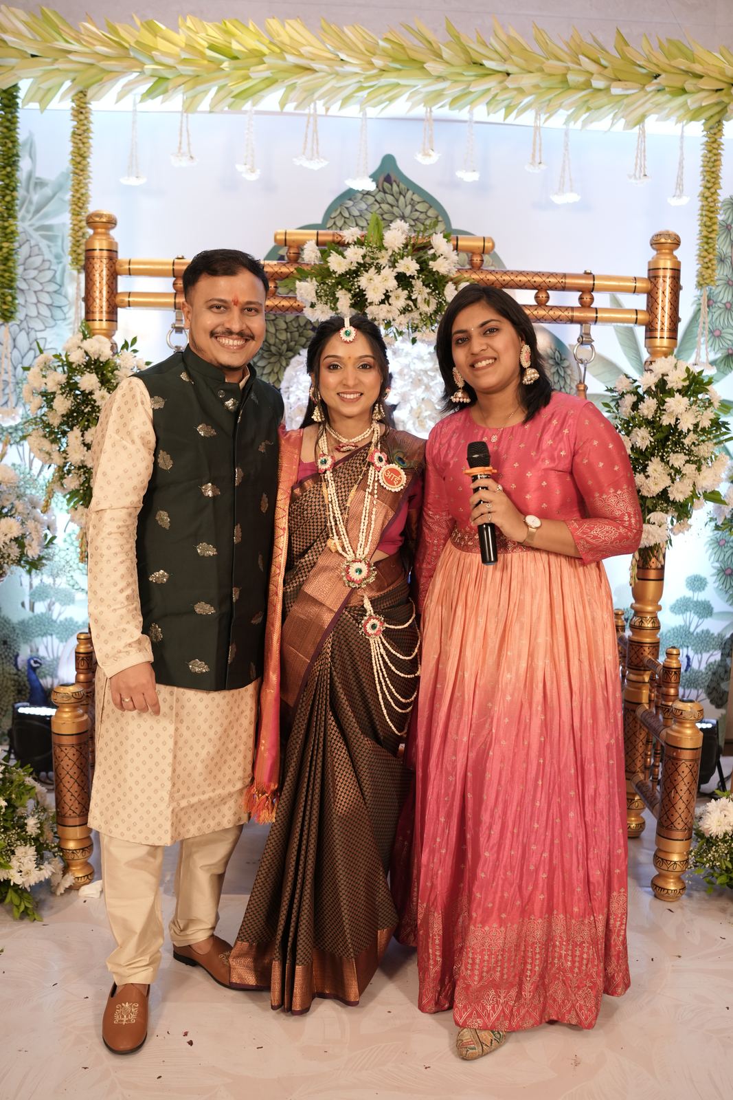 Anchor Ananya Kundu hosting an anniversary celebration