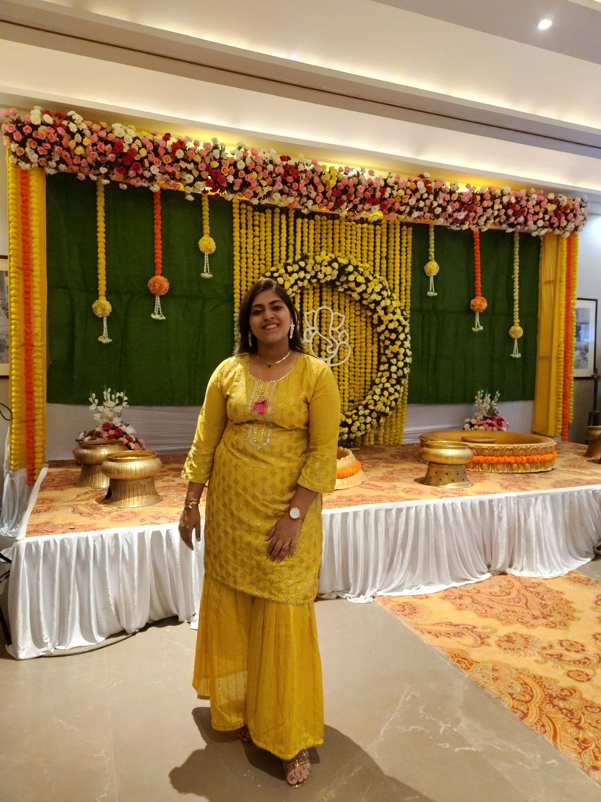 Anchor Ananya Kundu at a marigold-decorated haldi stage