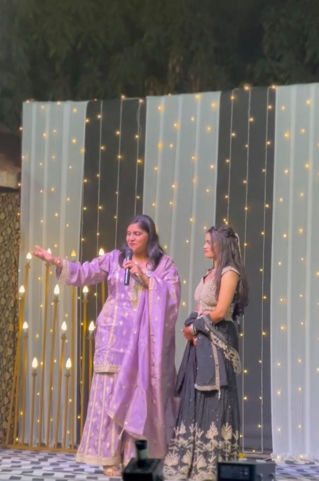 Anchor Ananya Kundu hosting a sangeet dance night