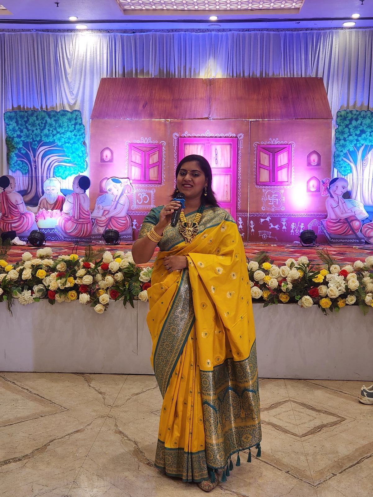 Anchor Ananya Kundu hosting morning wedding rituals